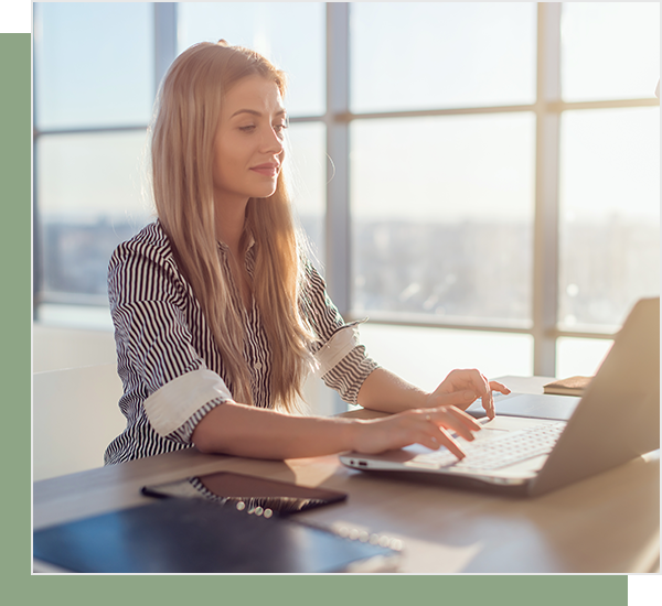 Woman sitting at a computer